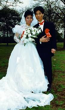 Bride and groom in park