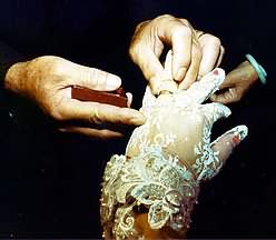 Bride receives gold rings