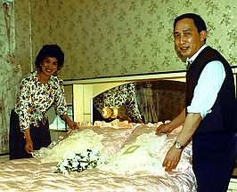 Chinese friends prepare wedding bed