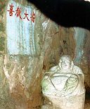 Buddha in cave at Longzhou