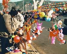 Shaped balloons on sticks.