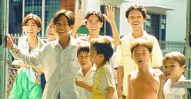 Vietnamese children by door.