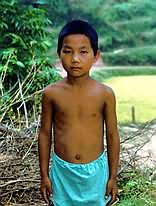 Farmer's son poses for photo.