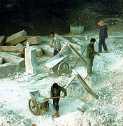 Workers using basic equipment